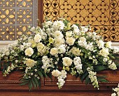 A floral casket spray from Meme's Florist